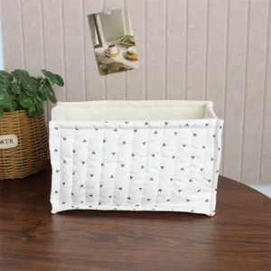 Korean style quilted fabric storage basket desktop organizer for cosmetics, toys, and snacks.