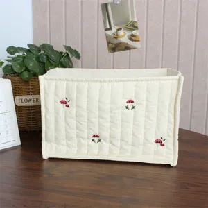 Korean style quilted fabric storage basket with cute mushroom embroidery for desktop tidy.