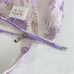 Vintage floral brocade bento bag, elegant purple canvas handbag for women daily commuting.