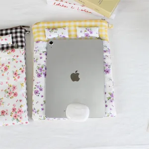 Cute quilted tablet sleeve bed design soft laptop inner bag with floral and plaid pattern.