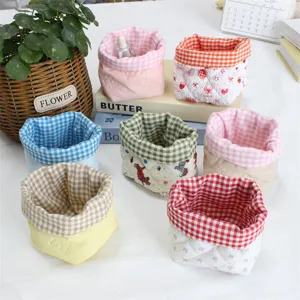 Panier de rangement de bureau en tissu, joli organisateur pliable pour cosmétiques et divers.