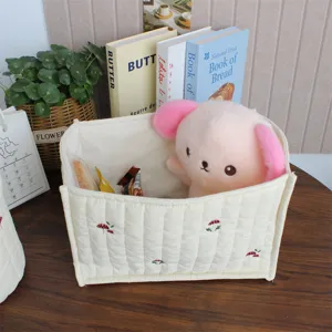 Korean ins style quilted fabric desktop storage basket for snacks, toys, and cosmetics organizer.