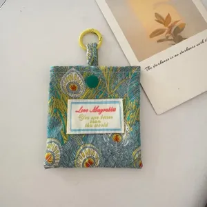 Mini stoffen portemonnee en oortjes tas met retro bloemenprint en handige ophanghaak.