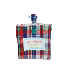 Ruitjes mini portemonnee college stijl draagbare oortelefoontas met hangende band en drukknop.