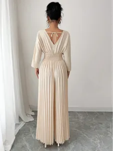 Elegant solid V-neck pleated wide leg jumpsuit for women, chic commuting fashion style.