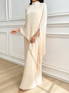 Detail view of elegant beige pleated loose long dress, featuring high neck and chic split sleeves.