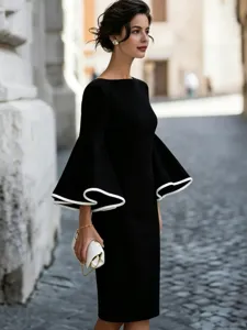 Elegant black slim midi dress featuring chic white trimmed bell sleeves for women detail view