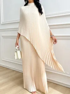 Elegant beige pleated mock neck irregular two-piece dress detail view for women's autumn style.