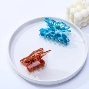 Pince à cheveux papillon creuse en acétate rétro accessoire élégant pour femmes