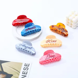Bunte Acetat-Haarklammern Set mit Strass-Buchstaben-Design, stilvolle Haar-Accessoires.