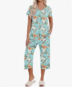 Floral print pajama set featuring a short-sleeve V-neck button top and cropped pants with pocket.