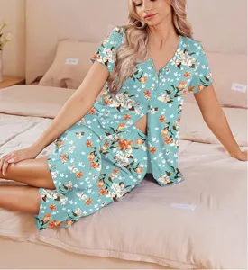 Floral print short sleeve pajama set with capri pants and pocket for women lounging.