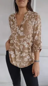 Casual long sleeve floral print blouse with sequin pocket for women, loose fit daily wear.