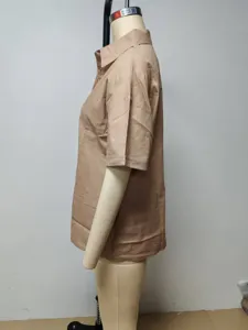 Detailed view of women's casual loose solid color short sleeve lapel shirt, summer style.