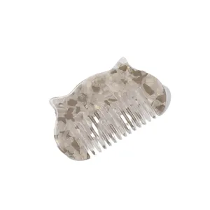 Minimalist fashion hair comb with retro tortoiseshell acetate pattern for daily styling.
