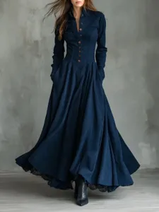 Detailed view of the vintage faux suede long dress with elegant lace trim and button front.