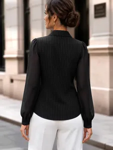 Back view detail of women's black pinstripe long sleeve blouse with sheer mesh sleeves.