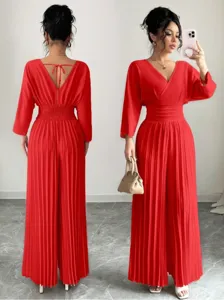 Chic solid V-neck short sleeve pleated wide leg jumpsuit detail view, elegant commute style.