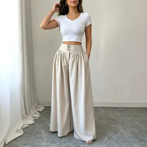 High-waisted wide-leg trousers with triple button closure, pleated waist, and elegant drape.