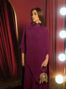 Detail view of a luxury purple pleated high neck asymmetric dress with elegant drape.