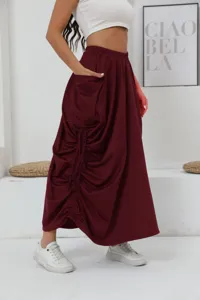 Gonna maxi casual a vita alta con arricciature laterali e grandi tasche funzionali.