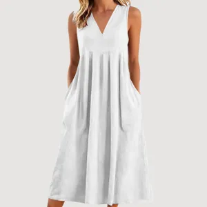 Lässiges weißes V-Ausschnitt ärmelloses loses Baumwoll-Maxikleid mit Taschen für den Sommer.