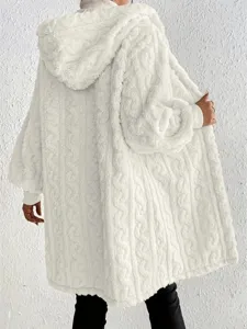 Detail view of a loose fluffy plush hooded long sleeve women coat in stylish white color.