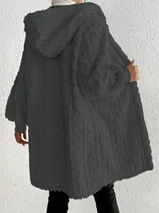 Detailed view of the fluffy fleece hooded coat, soft texture and loose fit for spring.