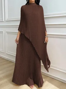 Detailed view of women's long sleeve pleated irregular dress set in solid brown color.