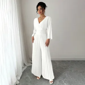 Elegant white V-neck pleated wide leg jumpsuit for women, chic commuter fashion apparel.