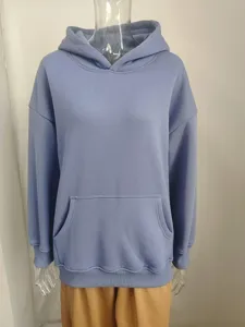 Detailed view of women's solid color casual loose hooded long sleeve sweatshirt with front pocket.