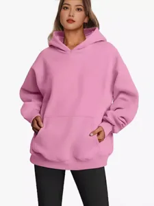 Women's solid pink oversized hooded sweatshirt, casual long sleeve basic pullover top main view.