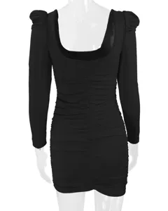 Black long sleeve ruched mini dress detail showing square neckline and puff shoulders.