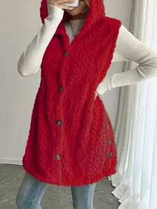 Close-up detail of the red fleece hooded vest showing soft texture and front button design.