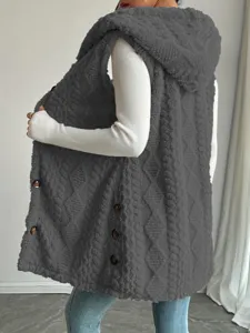 Detailed view of women casual winter fleece hooded vest, button closure and cozy texture.