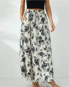 Jupe longue imprimée florale avec taille élastique à cordon et poches pour femmes.