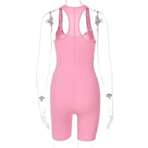 Pink ribbed knit sleeveless romper jumpsuit for women, high waist tight fitness activewear.