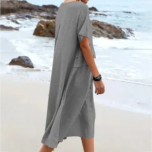 Casual loose cotton linen solid color round neck short sleeve midi dress detail view.