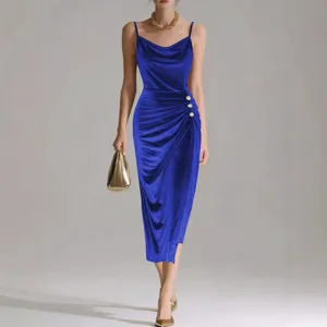Stunning royal blue velvet slip dress featuring a cowl neck and chic ruched side buttons.