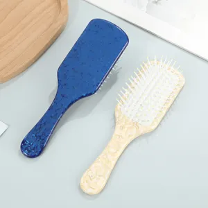 Creative pattern acetate hair cushion comb detailed view, portable massage smoothing tool.
