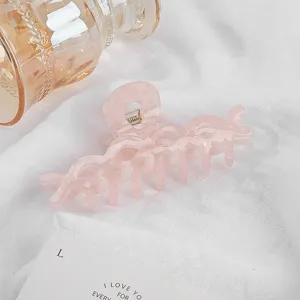 Molla per capelli in acetato rosa da donna, graziosi accessori per lo styling quotidiano.