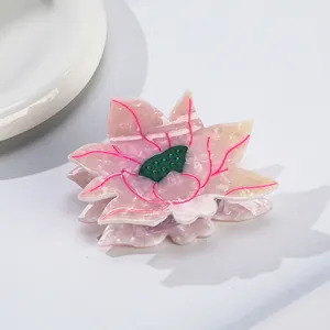 Pince à cheveux élégante en acétate en forme de lotus pour femmes, accessoire durable.