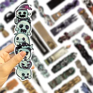 Close-up detail of retro Halloween ghost stack bookmark with cute dark design elements.