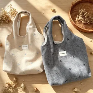 Koreaanse wollen tote bag met strikborduursuursel, chique veelzijdige schoudertas voor dames.