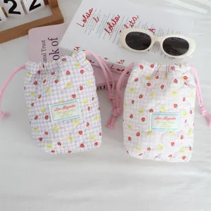 Quilted padded drawstring camera bag, cute strawberry bunny pattern storage pouch.