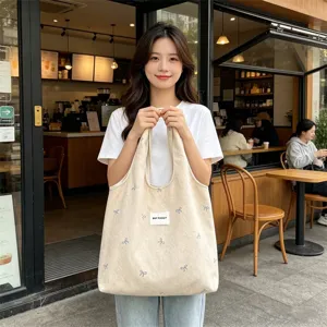 Casual canvas shopper tas voor dames, stijlvolle schoudertas met strik borduurwerk en grote capaciteit.