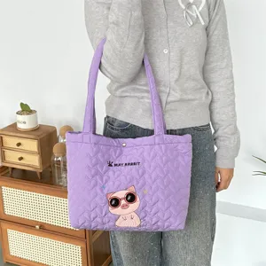 Purple quilted tote bag with cute pig embroidery and heart pattern for daily commuting.
