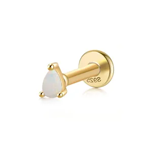 Detail shot of a S925 sterling silver gold-plated opal stud earring with internal thread