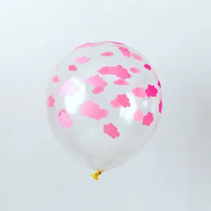 Detailed macro view of a transparent latex wedding balloon printed with pink clouds.