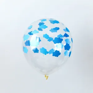 Close-up of transparent latex balloon with blue cloud patterns
